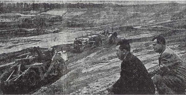 newspaper articler and pciture showing Louis Garner watching the bulldozers work