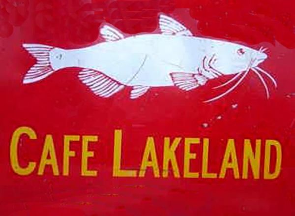 the sign from Cafe Lakeland showing a catfish